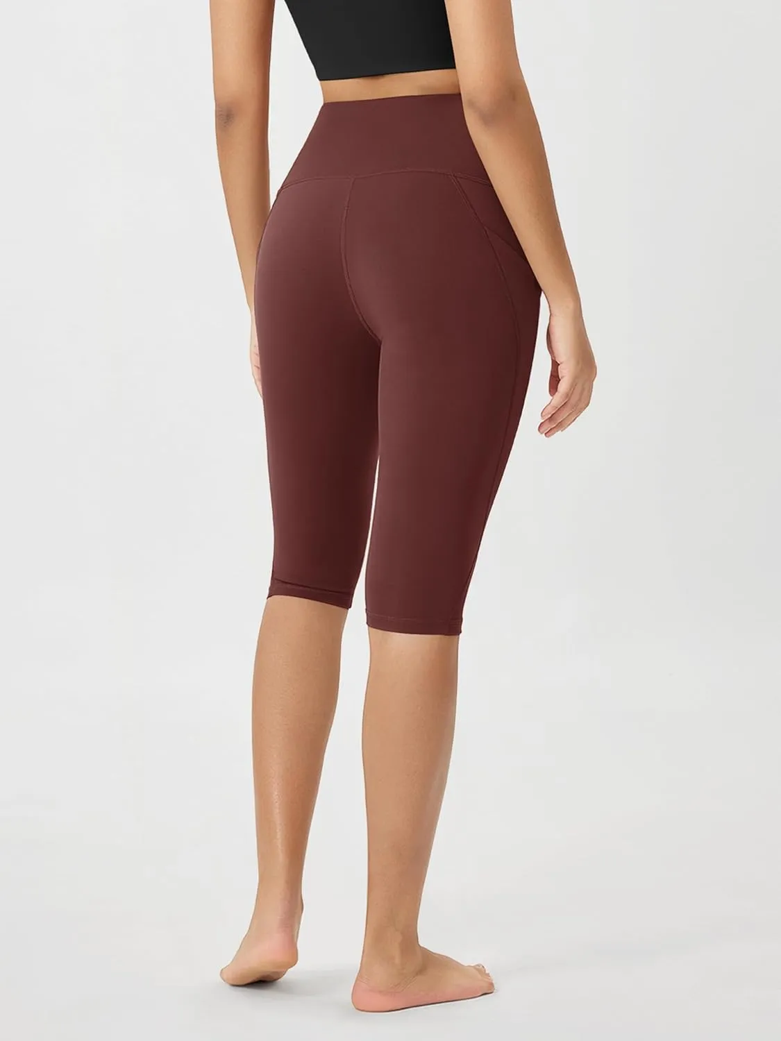 ODODOS Women's High Waisted Yoga Capris with Pockets, Tummy Control Non See Through Workout Athletic Running Capri Leggings