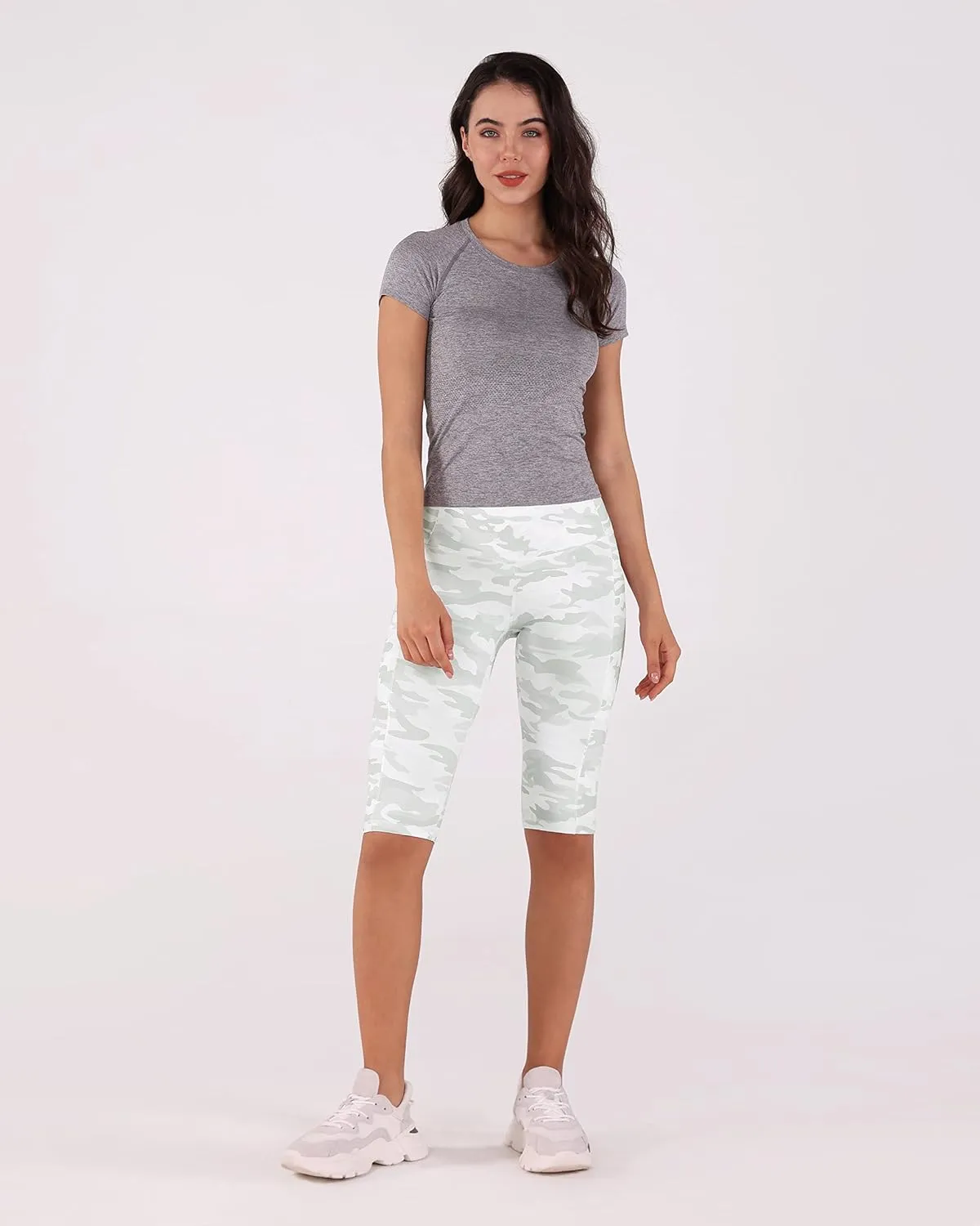 ODODOS Women's High Waisted Yoga Capris with Pockets, Tummy Control Non See Through Workout Athletic Running Capri Leggings