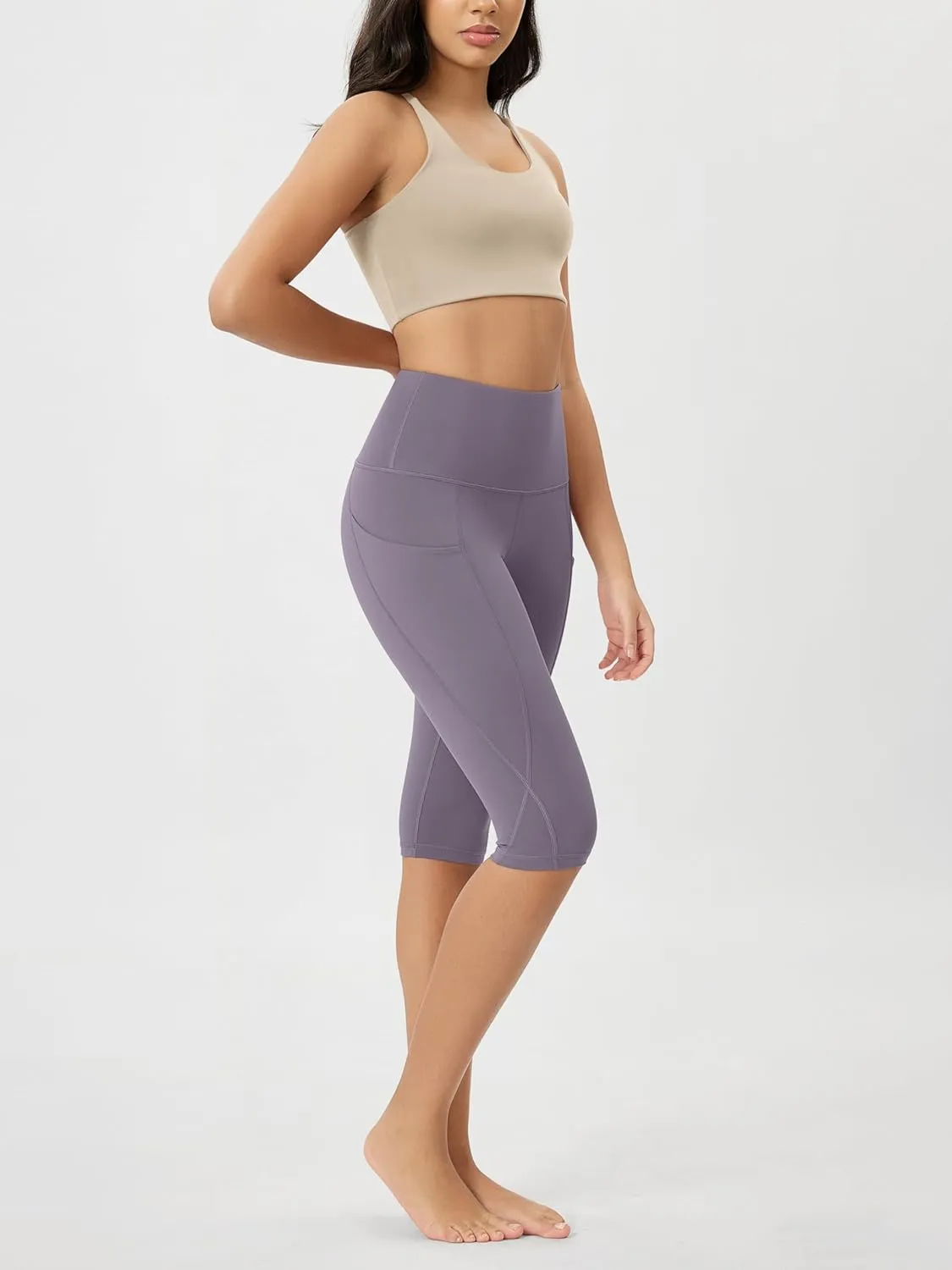 ODODOS Women's High Waisted Yoga Capris with Pockets, Tummy Control Non See Through Workout Athletic Running Capri Leggings